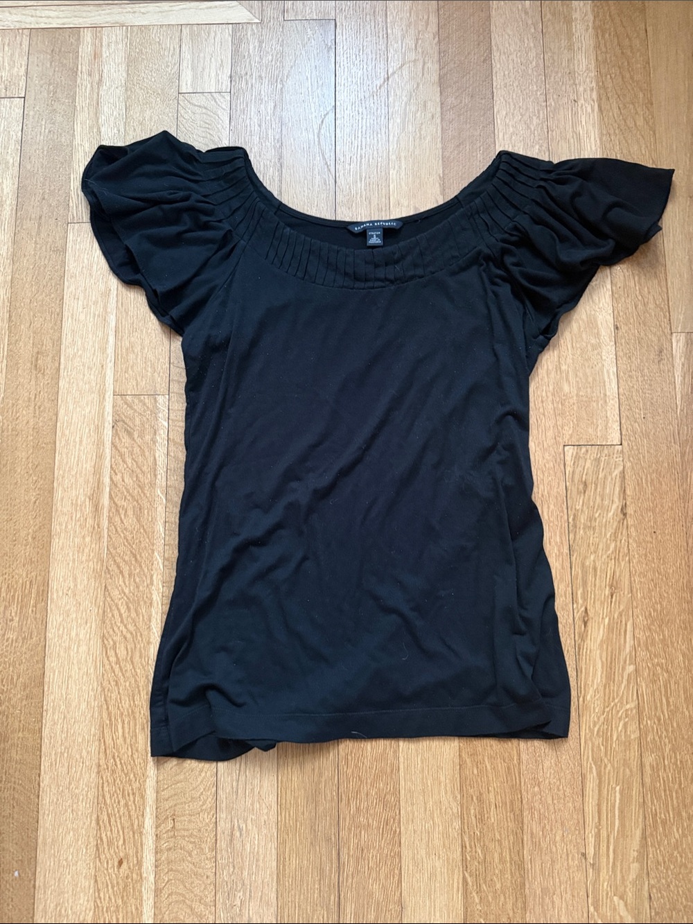 Banana Republic women’s size Small black flutter sleeve top.